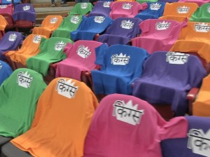 Seats adorned with t-shirts saying "Kings" in Hindi; fans at the game each got one