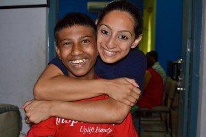 An American student mentoring an Indian youth through Uplift Humanity's program (courtesy of Uplift Humanity India)