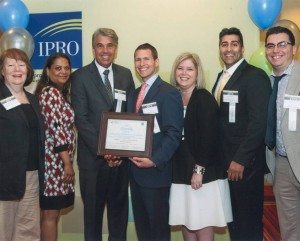 Maureen Valvo, Senior quality improvement specialist, IPRO ( far left), presents the 2014 Quality Award (from left to right): Josephine Ledee, Dr. Robert Roche, Charles Edouard Gros - CEO of Bellhaven, Kelly Moteiro, Dr. Sachin Chopra and Matthew Pernice.