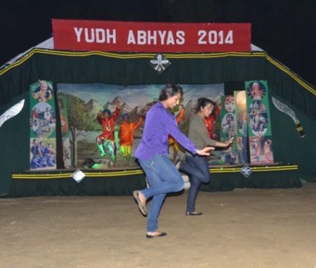 Cal Guard sergeants Jasleen and Bree Khaira get into a groove during a social event organized by the Indian Army.