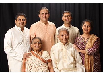 The Mehta Family - Back row from left to right: Siblings Dharmesh, Jay, Rahul and Nisha; Front row: Parents Jyoti and Bhupat.