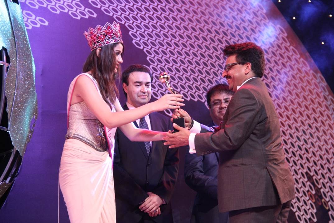 Agarwal receiving award