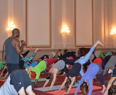 Keith Mitchell leading the yoga event on Capital. Photo via Congressional Yogi Association