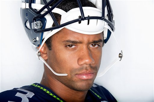 Seattle Seahawks quarterback Russell Wilson poses for a portrait during the 2012 NFLPA Rookie Premiere photo shoot in Los Angeles, Friday, May 18, 2012. (Tomas Ovalle/AP Images for NFLPA)