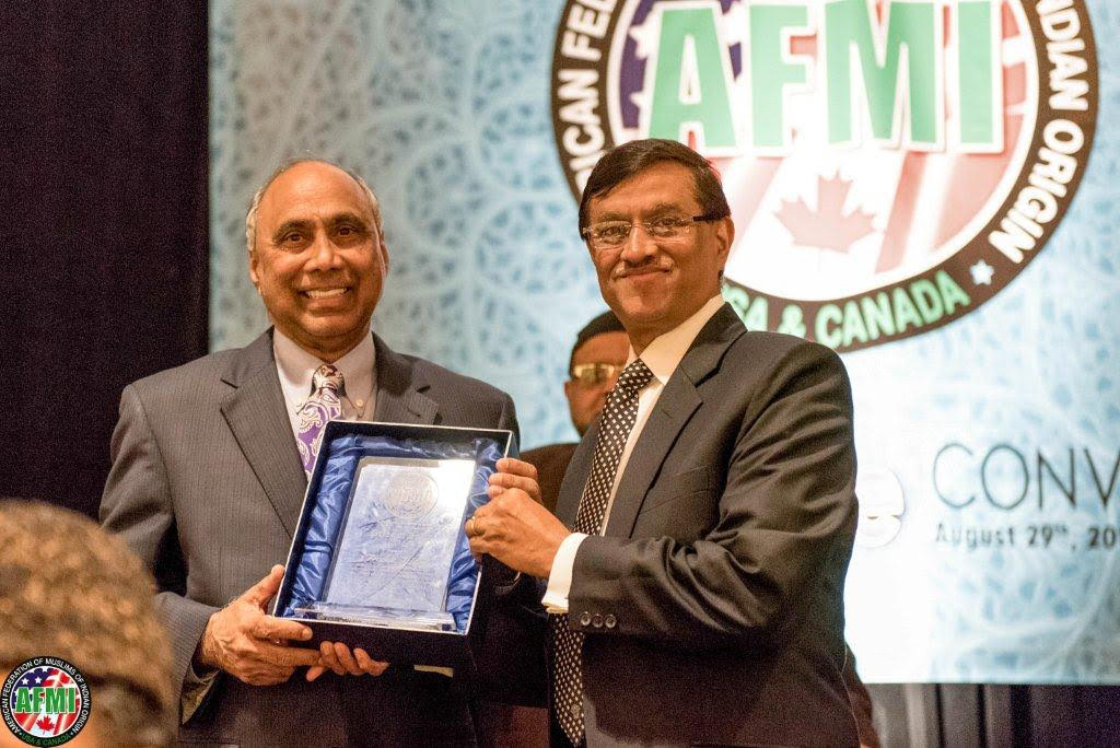 Photo of Frank Islam with Consul General of India Dnyaneshwar M. Mulay of New York in receiving Pride of India Award in Boston