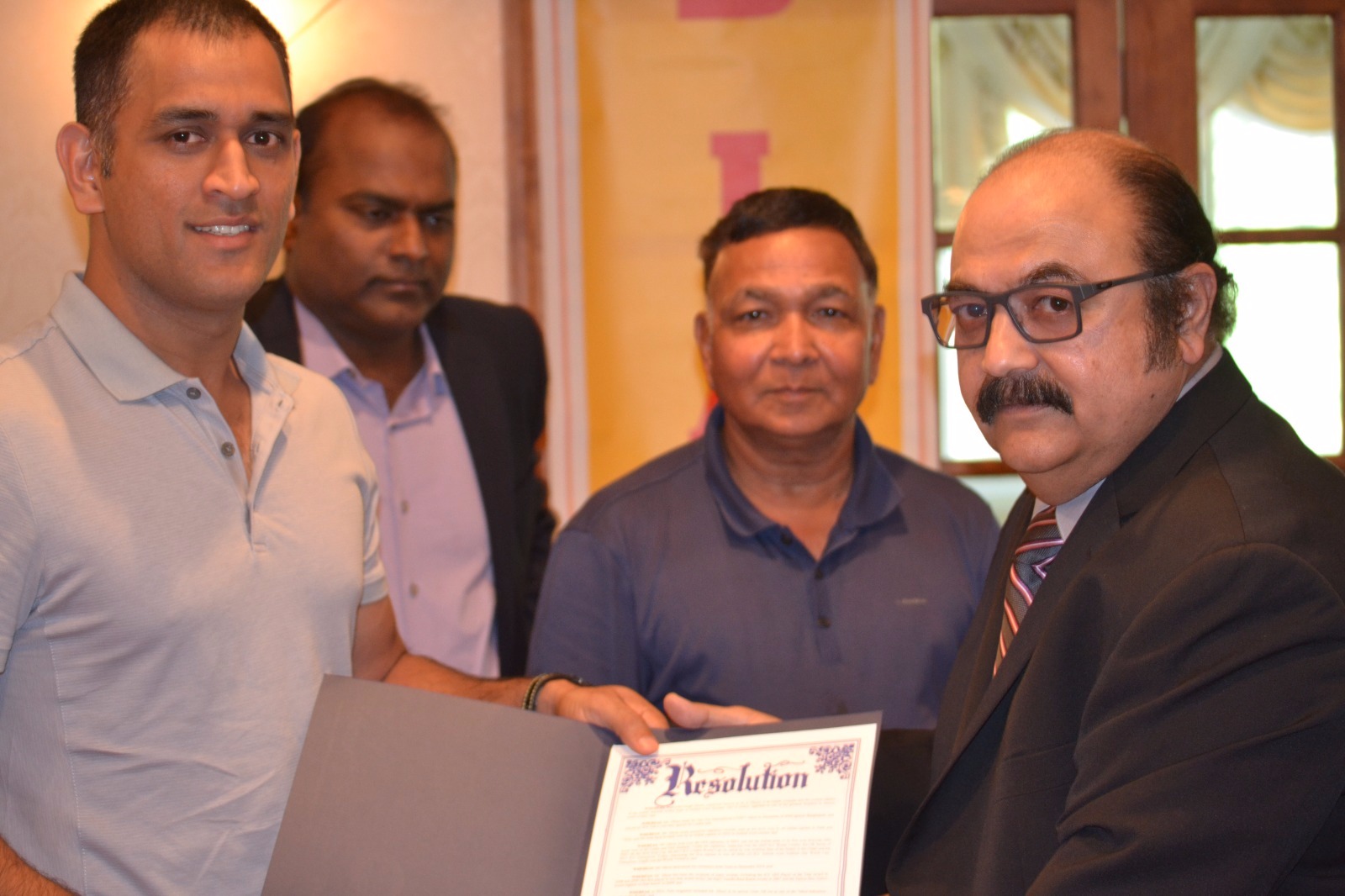 Atul Huckoo, President, Edison Cricket Club, presented a proclamation to Mahendra Singh Dhoni, at the Country Club, in Toms River, New Jersey.