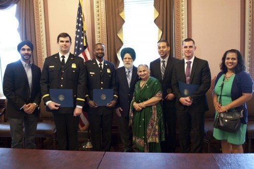 US officials with Manku