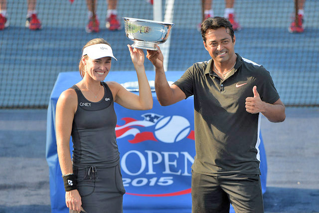 Martina Hingis and Leander Paes with the winning trophy (Courtesy of usopen.org)