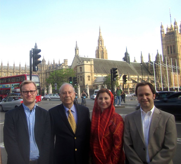 Journey Into Europe team members (from left to right) Harrison Akins, Akbar Ahmed, Dr. Amineh Hoti and Frankie Martin outside of the UK Parliament Building in London.