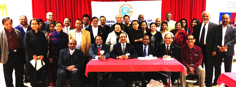 Speakers, organizers and some participants at the recently held community meeting on NRI Property Issues in India. Seated in front row from L. to R.: Kerala Center President Thambi Thalappillil, GOPIO Founder President Dr. Thomas Abraham, GOPIO-New York President and panelist Anand Ahuja, Panelist Pambayan Meyyan, GOPIO-New York Founder President Lal Motwani and Kerala Center Executive Director E.M. Stephen