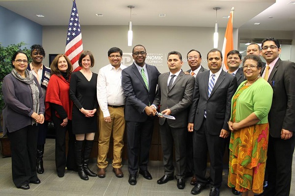 PG County Economic Development Corporation President and CEO James Coleman (sixth from left) and Allied Deccan Director G. Raj Pant (seventh from left) at the ribbon-cutting ceremony on November 17, 2015. 