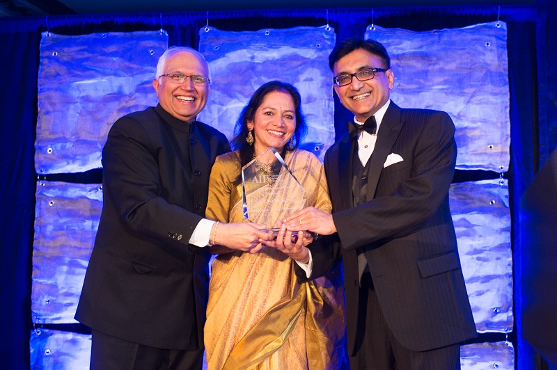 Raj (right) and Nalini Sharma with the Special Recognition award.