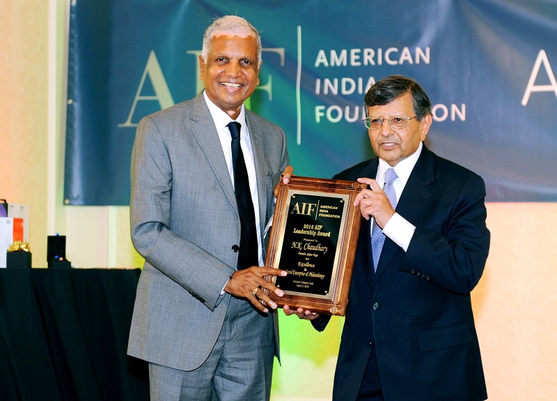 N.K, Chaudhary receiving the award from Prof. Jag Sheth at the AIF gala on April 2, 2016.