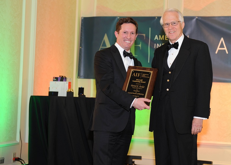 Xylem Inc. CEO Patrick Decker (left) after receiving the award from Phil Bolton, President of Global Atlanta, at the AIF gala on April 2, 2016. Photo credit: ByteGraph