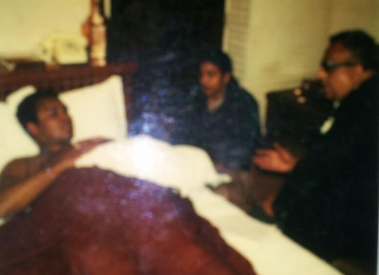 Surajit Sen (right) interviewing Muhammad Ali from his bedside.