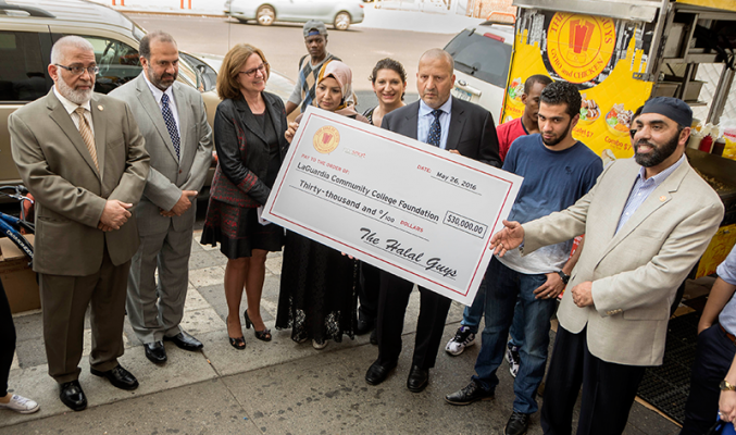 The Halal Guys presents a gift of $30,000 to LaGuardia CommunityCollege President Gail O. Mellow