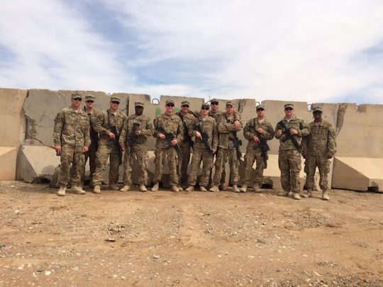 On the far right, Army First Lt. Varun Hollabbi with his platoon in Afghanistan in 2015