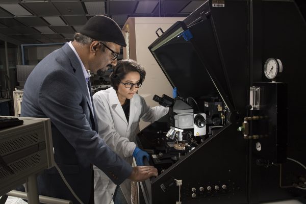 Purdue University researchers Aida Ebrahimi, a doctoral student, and Muhammad Ashraful Alam, the Jai N. Gupta Professor of Electrical and Computer Engineering, are working to develop a new type of electronic sensor to detect and classify bacteria for medical diagnostics and food safety. (Purdue University photo by John Underwood)