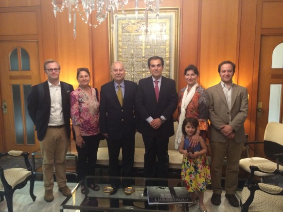 Akbar Ahmed (third from left) and members of his team with Lord Mayor of Cordoba (center). In the backdrop is a poem about the Cordoba Mosque by Allama Iqbal.
