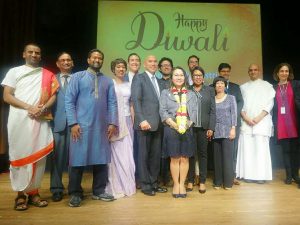 At a Diwali celebration hosted by DC Mayor's Office of Asian and Pacific Islander Affairs (MOAPIA), held at the Smithsonian's Freer Gallery of Art, are seen: Deputy Mayor for Health and Human Services Hyesook Chung (center); Pandit Venkatacharyulu of Sri Siva Vishnu Temple (left); Atul Rawat, general manager of SSVT (second from left); emcee Sonya Gavankar (fourth from left); David Do, executive director of MOAPIA (fifth from left); Charon Hines, director of the Mayor's Office of Community Affairs (fifth from right); Brahmachari Vrajvihari Sharan, director of Hindu Life at Georgetown University (second from right); Debra Diamond, curator at the Freer-Sackler galleries (right); and DC AAPI commissioners