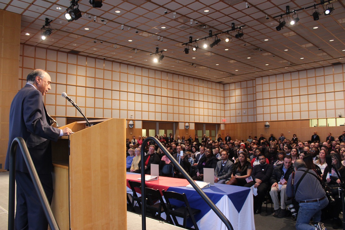 Indian American entrepreneur and philanthropist Frank Islam addressing newly naturalized Americans at the JFK Library in Boston on November 30, 2017.