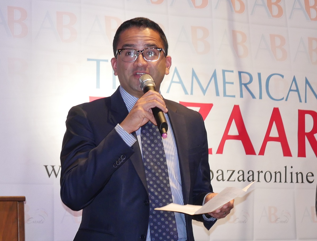 Gautam Raghavan, a former Obama White House official and Executive Director of the Indian American Impact Fund, introducing honoree Mahinder Tak (not in picture) at the American Bazaar Women Entrepreneurs and Leaders Gala in Bethesda, MD, on November 16, 2018.