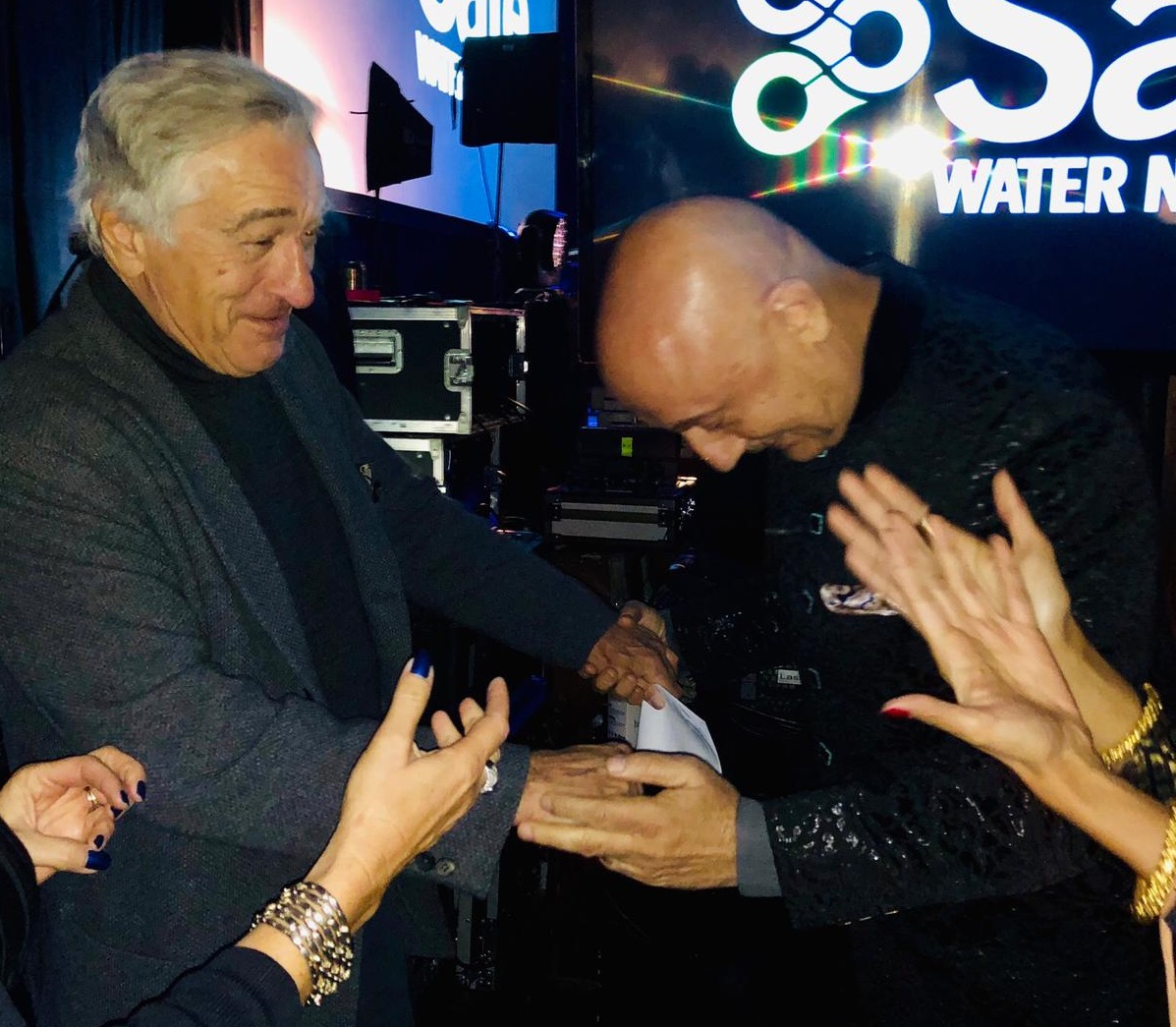Anupam Kher (left) greeting Robert De Niro when the two actors met at Safe Water Network's "Water for All Ball" in New York on October 23.