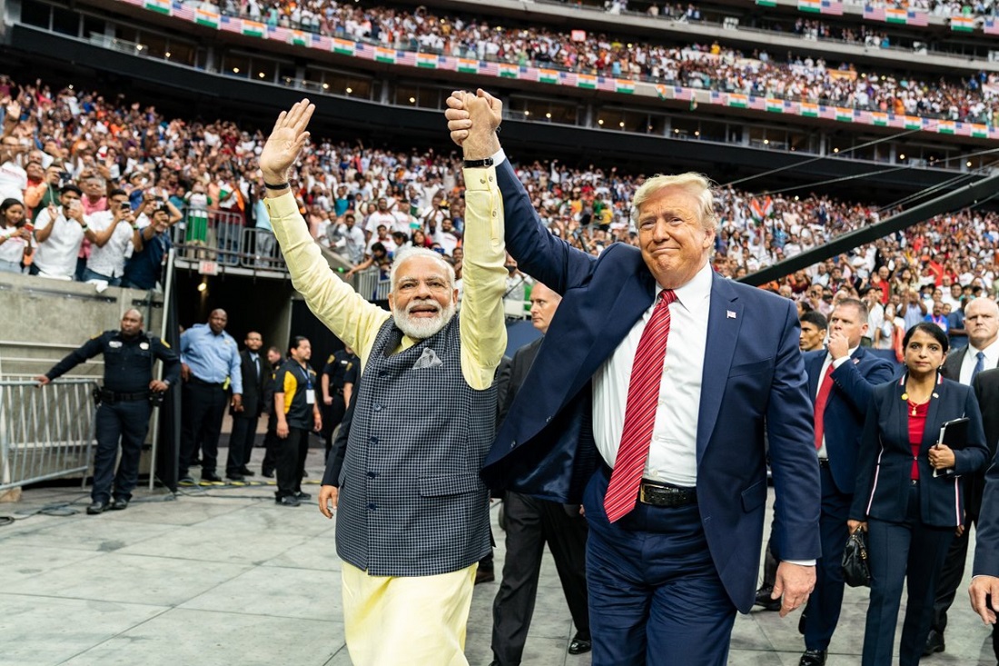 President Donald Trump holds hands with Prime Minister Narendra Modi as they take a surprise walk together around the NRG Stadium in Houston, Texas. Official White House Photo by Shealah Craighead