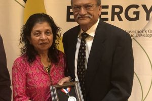 Kalpana Patel and Dr. Dinesh Patel with the Governor's Medal for Science and Technology Lifetime Achievement.