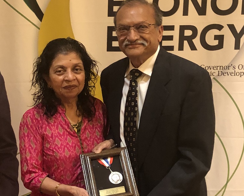 Kalpana Patel and Dr. Dinesh Patel with the Governor's Medal for Science and Technology Lifetime Achievement.