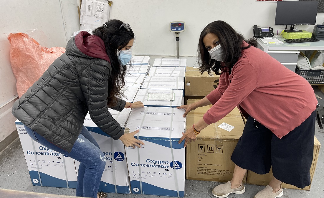 NYuplift volunteers packing Oxygen concentrators ready to be shipped to India.