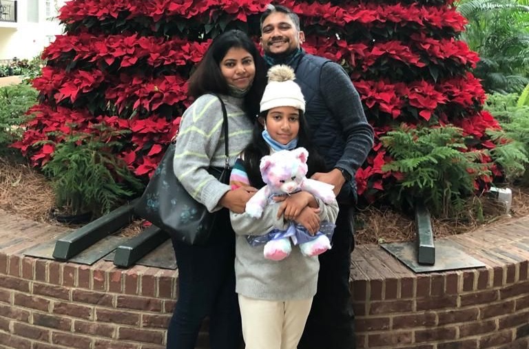 Payal Raj with her husband and daughter
